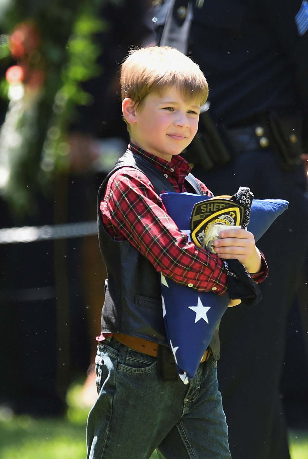 Boy at Sheriff Funeral